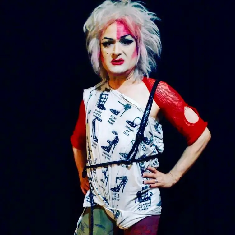 Anita posing with hands on hips